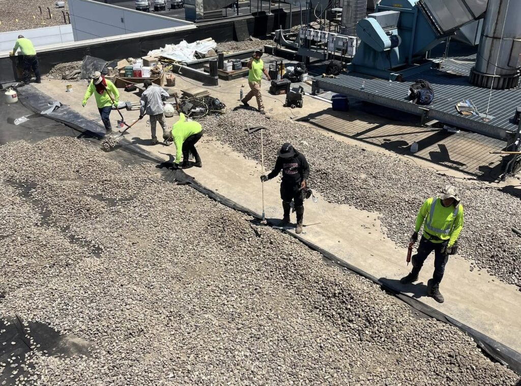 Weathertite team working on a roof